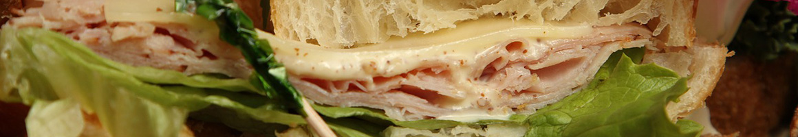Eating Sandwich Cafe at The Picnic Basket restaurant in New York, NY.